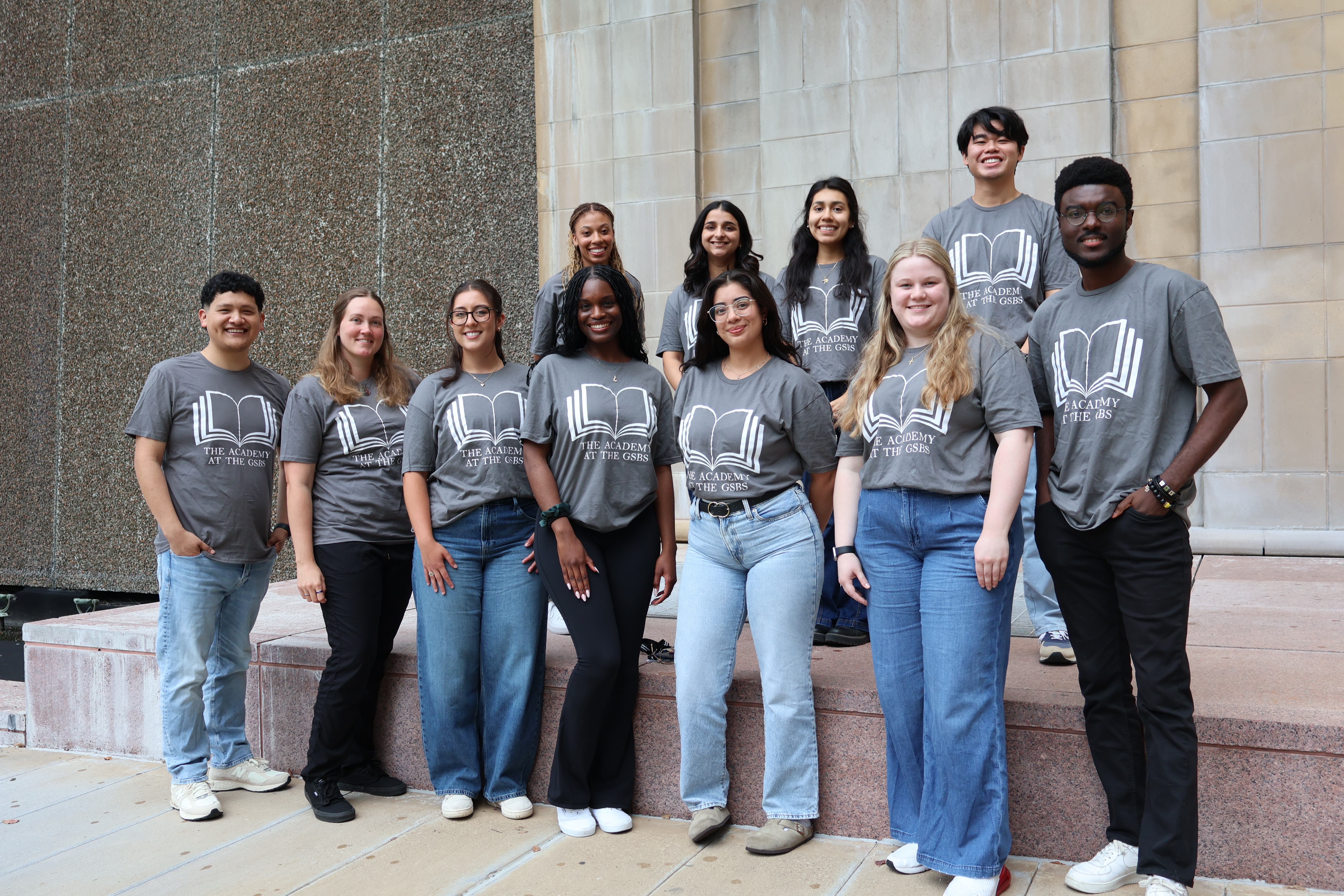 Cohort 2025 group phote-waterwall.JPG